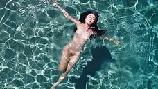 Japanese Babe Seducing A Black Guy In The Pool